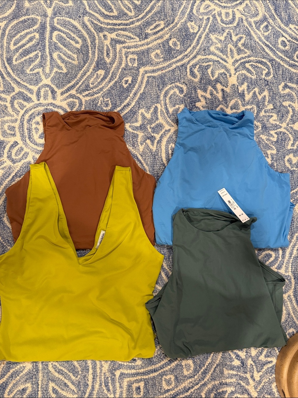 Victoria's Secret Four-Pack bodysuit Tops in Blue, Olive, Lime and Brown